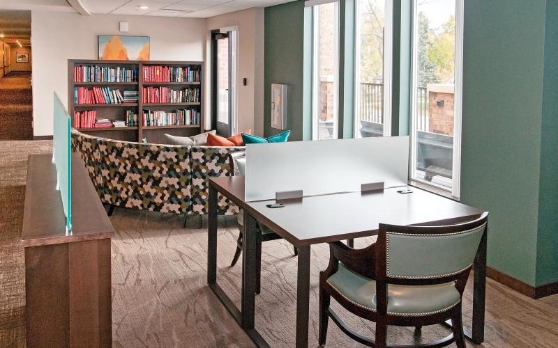 a room with a table and chairs